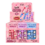 BRILLO GLOSS LIP OIL CARE LLAVERO SAS